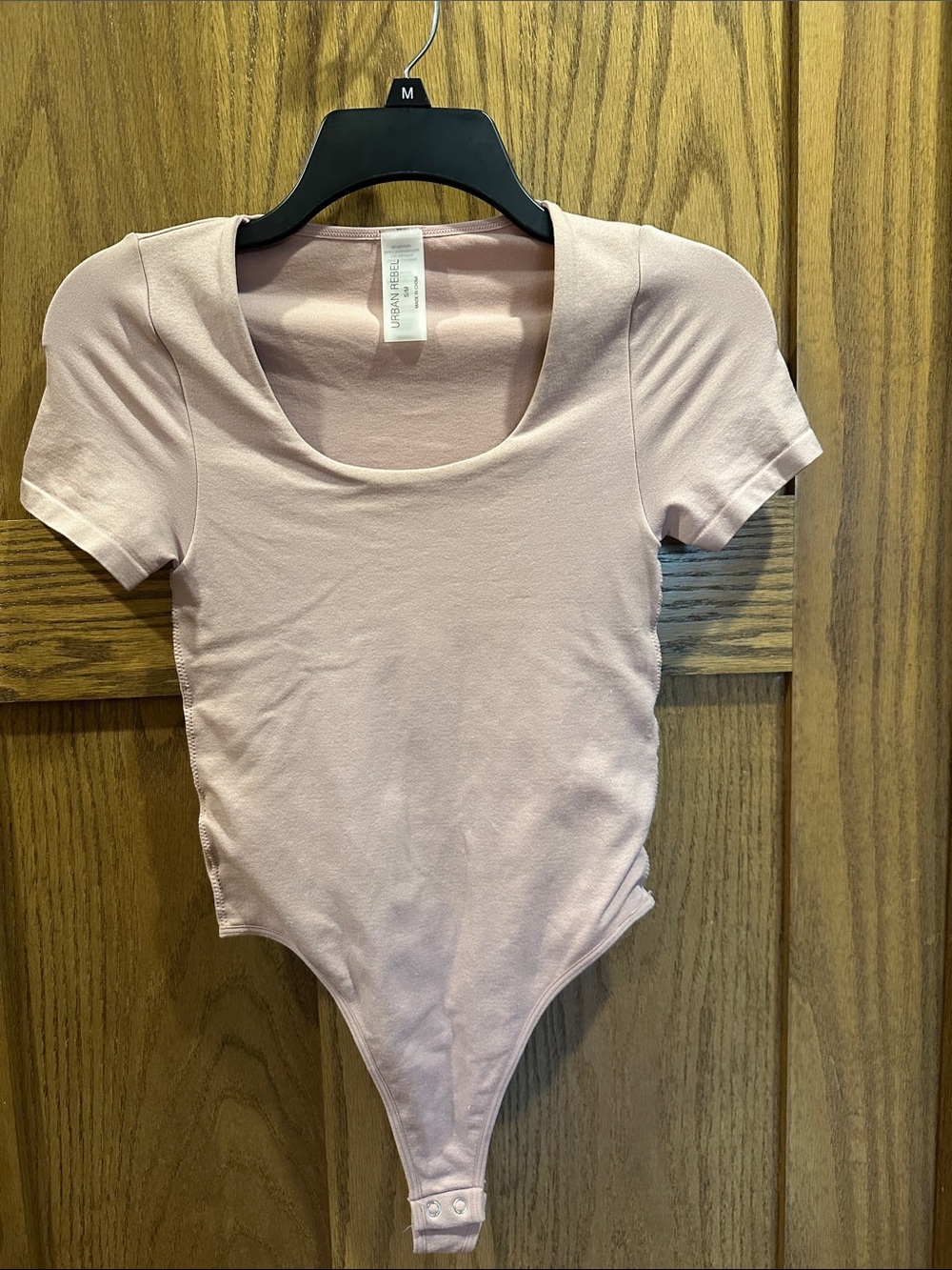 Urban Rebel Pale Pink Scoop Neck Short Sleeve Bodysuit